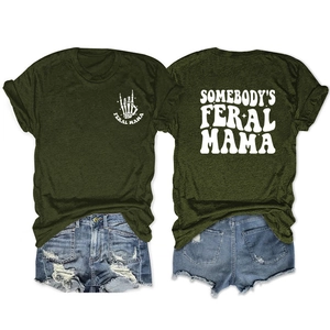 Army green Feral Mama graphic t-shirt paired with distressed blue denim shorts