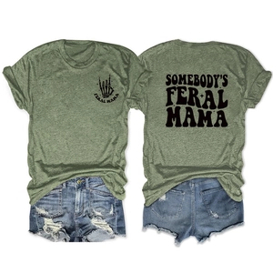 Detailed front and back view of olive green Feral Mama t-shirt with ripped denim shorts
