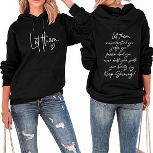 Front and back view of black hoodie featuring Let Them heart print and back quote