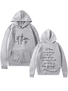 Detail of grey hoodie with motivational back print and front heart graphic