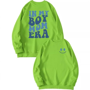 Bright green Boy Mom Era sweatshirt with blue back print and front smile logo graphic