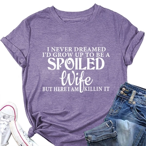 Detailed flat lay of purple marl t-shirt with white quote print and denim jeans
