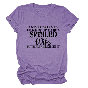 Detail of heather purple t-shirt featuring black letter print and cuffed sleeves