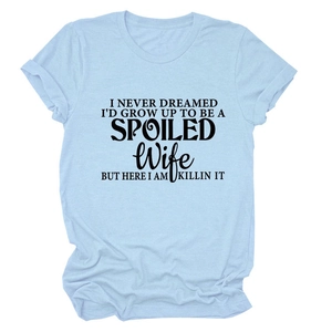 Detail of light blue crew neck cotton T-shirt featuring retro black graphic quote print