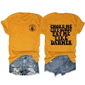 Front and back detail of orange cotton T-shirt featuring gothic black letter printing