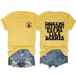 Front and back detail of yellow t-shirt with black graphic print and denim shorts