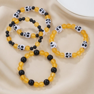Set di braccialetti di perline di Halloween con teschi in arancione e nero per feste