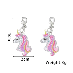 Detailed view of unicorn acrylic ear clips with pink glitter and size specifications