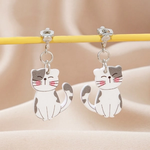 Cute white acrylic cat clip-on earrings with pink blush and adjustable silver screw backs