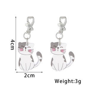 Detail view of cute cat clip-on earrings for kids with 4cm length and 3g weight