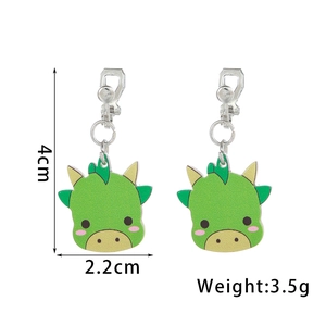 Detail view of cute green dinosaur clip-on earrings with 4cm height and 3.5g weight
