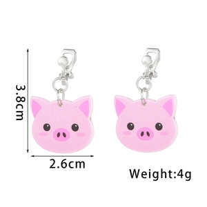 Detail of pink pig acrylic clip-on earrings with size dimensions 3.8cm height and 4g weight
