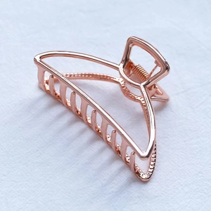 Minimalist rose gold half-moon metal hair claw clip for women's daily hair styling