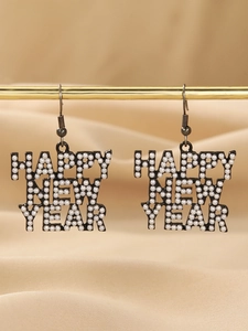 Detail of Happy New Year drop earrings with white pearls on black alloy base