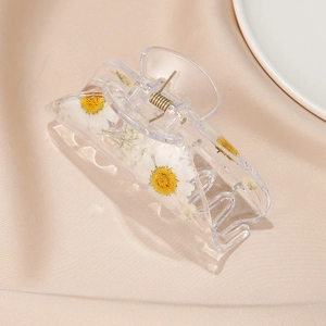 Geometric acrylic hair claw with real dried daisies and gold spring on satin
