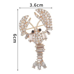 Golden lobster brooch with sparkling crystals and rhinestones, size 6cm by 3.6cm