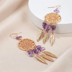 Bohemian golden dreamcatcher earrings with purple amethyst stones and metal feathers