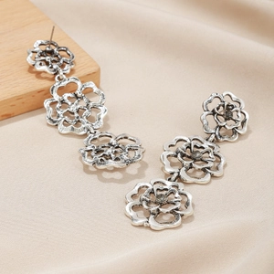 Vintage hollow flower drop earrings with silver alloy and dark crystals for women