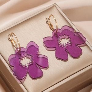 Fashionable purple acrylic flower hoop earrings with layered petals and gold metal hooks