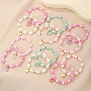Colorful beaded heart and pearl bracelet set with butterfly and flower pendants