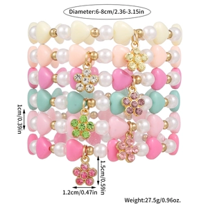 Colorful beaded bracelets for kids with flower pendants and size measurements detail