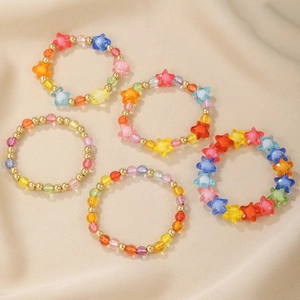 Colorful handmade beaded bracelet set with vibrant heart and star pearls for girls