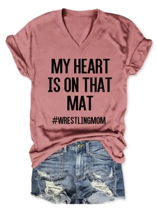 Detail of V-neck T-shirt with My Heart Is On That Mat print and wrestling mom text