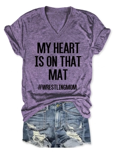 Detail of heather purple V-neck T-shirt with My Heart Is On That Mat wrestling print