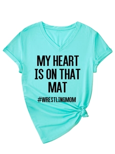 Detail of V-neck mint green T-shirt with My Heart Is On That Mat wrestling mom print
