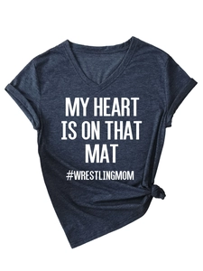 Detail view of navy V-neck T-shirt with twisted knot and Wrestling Mom slogan print