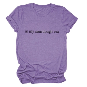 Detail of In My Sourdough Era text print on purple heather cotton blend t-shirt