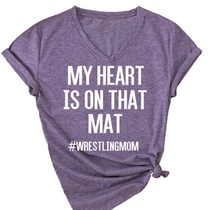 Women's V-neck heather purple T-shirt with My Heart Is On That Mat wrestling slogan