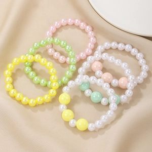 Colorful plastic pearl bracelet set for girls with cute floral and candy beads