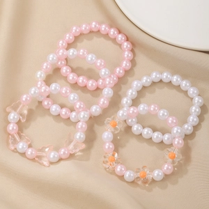Set of 6 cute pink and white beaded bracelets for girls with butterfly and flower charms