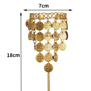 Ethnic gold coin tassel hair accessory with woven ring and detailed metal charms