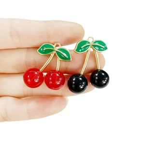 3D cherry fruit alloy pendants with red and black resin spheres and gold metal leaves