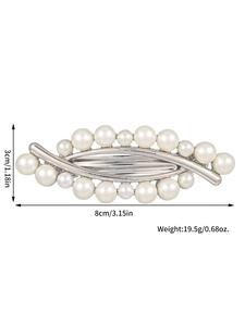 Detail view of pearl spring hair clip with dimensions 8cm by 3cm and 19.5g weight
