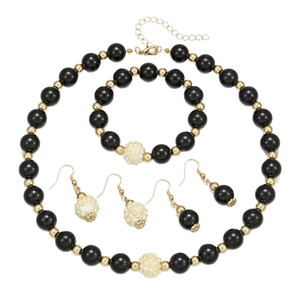 Handmade black beaded jewelry set including necklace bracelet and earrings with gold accents