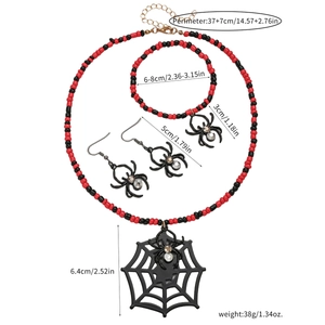 Halloween beaded jewelry set featuring red and black spiderweb necklace and earrings