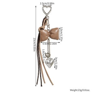 Detailed dimensions of cherry bow heart keychain with leather bow and braided rope strap