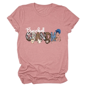 Close-up of Baseball Grandma slogan with leopard and star patterns on pink t-shirt
