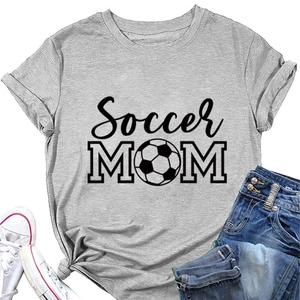 Detailed flat lay of gray Soccer MOM t-shirt with black graphic print and denim pairing