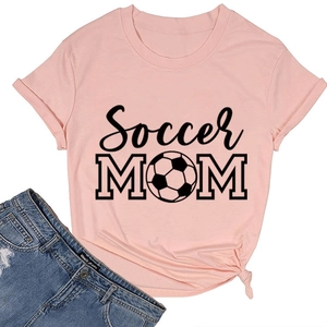 Close-up of pink Soccer Mom T-shirt with soccer ball graphic and stylish hem knot