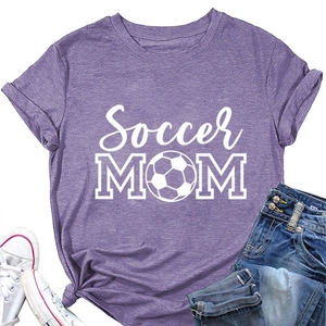 Flat lay of purple heather soccer mom t-shirt with knotted hem and casual accessories