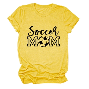 Detailed view of the Soccer MOM black print and football icon on a yellow heather t-shirt