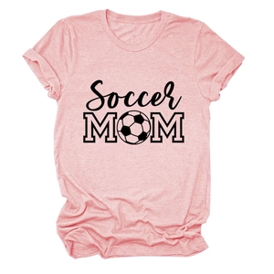 Close-up of pink Soccer MOM T-shirt featuring heather texture and football graphic print