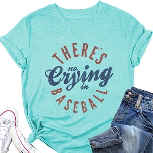 Mint green baseball slogan t-shirt paired with denim jeans and white canvas shoes