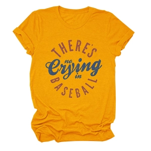 Detail of ginger yellow cotton T-shirt featuring vintage baseball slogan print texture