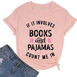 Pink cotton t-shirt with books and pajamas quote print paired with denim shorts