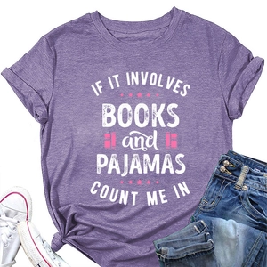 Close-up of purple heather T-shirt featuring 'Books and Pajamas' graphic print